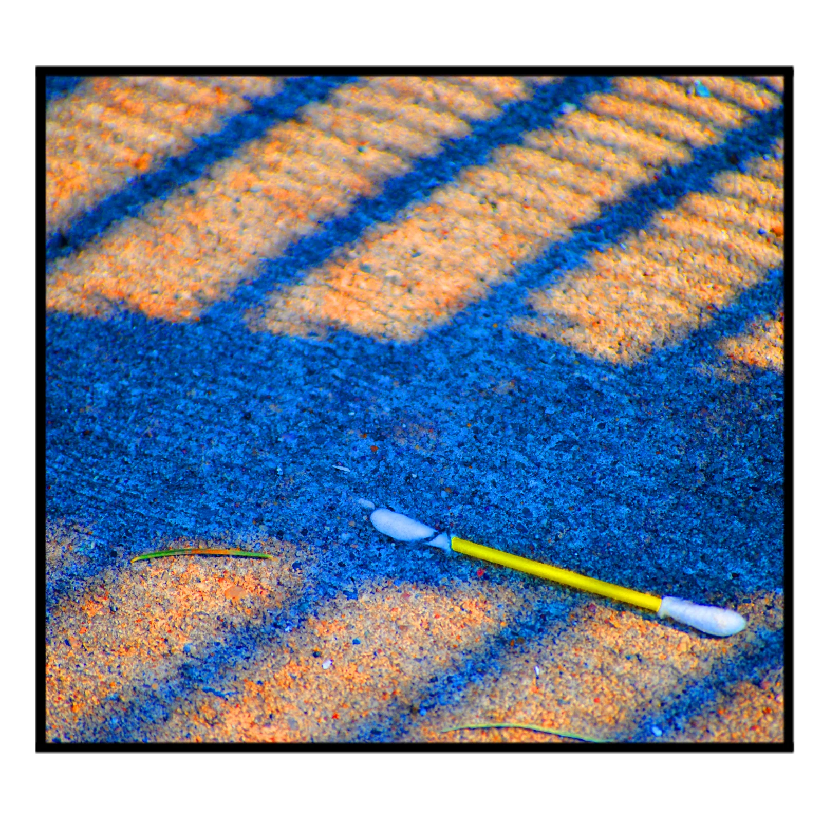 Yellow Q Tip